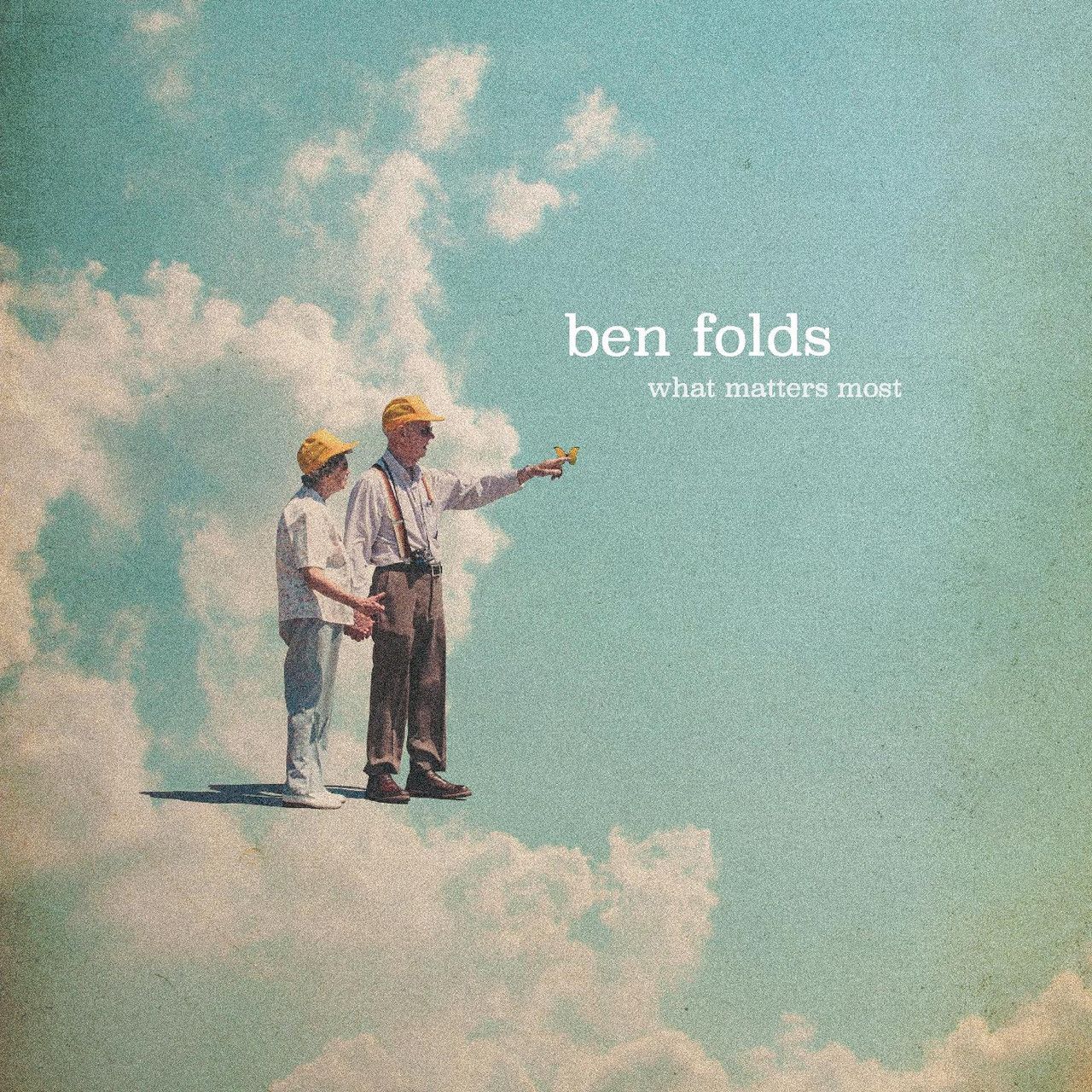 The image is an album cover. An elderly couple holding hands on a sky background. Words in white read "ben folds" and in smaller printe it reads "what matters most". what matters most.